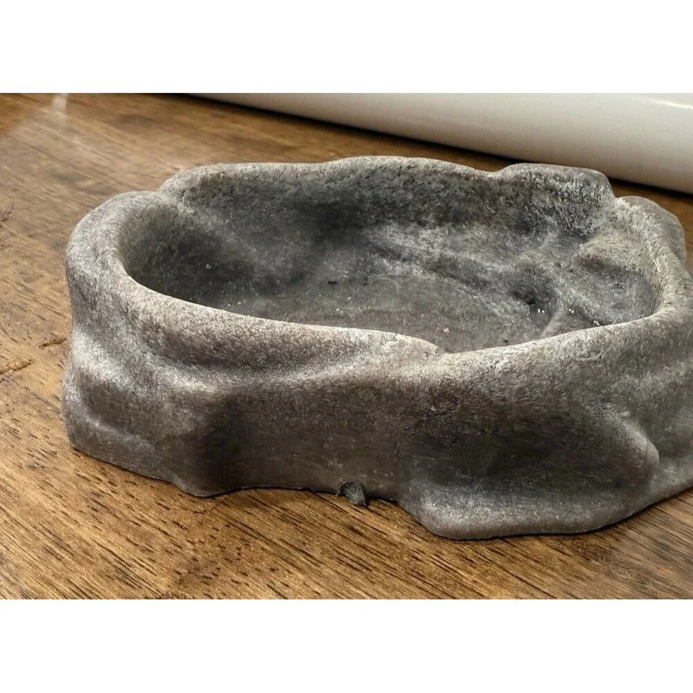 miscellaneous  Reptile supplies, One hide, PVC tubing, Food and water bowl ￼